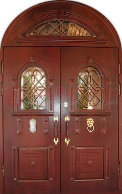 Стальная арочная дверь со стеклом и ковкой ДА-30 в дом из кирпича в Зеленограде